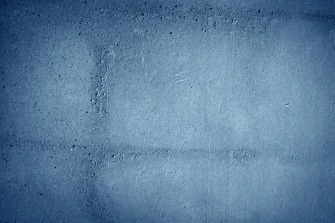 Surface with a dark blue color featuring a rough, uneven texture Stock Photos