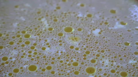 Surface of dirty soapy water with a small amount of oil. Stock Footage 236101061