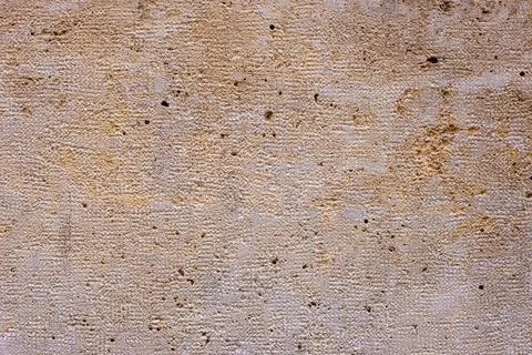 The surface displays various textures, marks, and colors that suggest Stock-Fotos