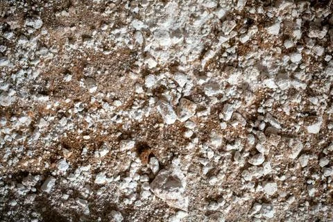 Surface of a dry brown lime mortar. Surface of a dry brown lime mortar. Co... 스톡 사진