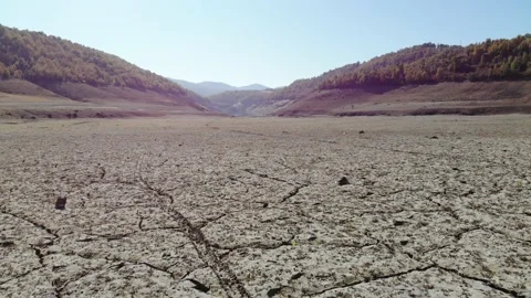 Surface of dry lake and many cracks on the  ground Stock Footage 143937399