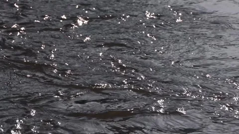 Surface of a fast babbling river, close up 库存影片 301680926