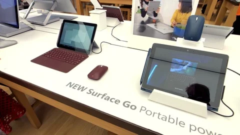 Surface Go tablet ps in Microsoft store Stock Footage 98203487
