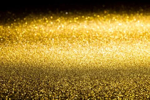 The surface of gold sparkling spangles. Background for glamor Stock Photos
