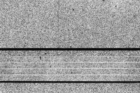 Surface of granite wall of building Stock Photos