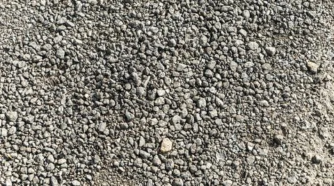 Surface grunge old rough of asphalt. crushed stone, gravel. Texture Backgroun Stock Photos