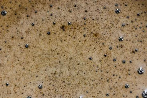 The surface of hot coffee in close-up Stock Photos