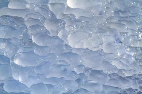 The surface of the ice is covered with bizarre bumps Stock Photos