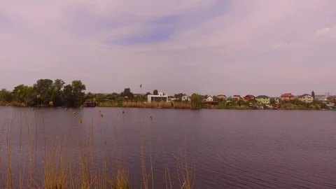 The surface of the lake behind the reeds Stock Footage 108475309