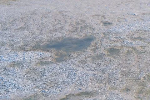The Surface of the Lake Covered with ice Stock Photos