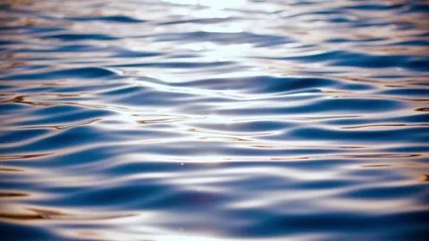 The surface of the lake is sparkling - sunset - collection Vídeo Stock 258884442