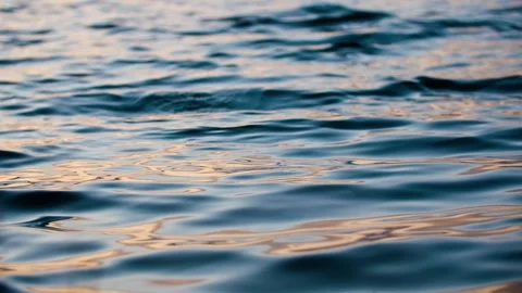 The surface of the lake, the water surface, the sunset, the water surface, t 動画素材 257061454