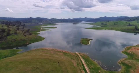 Surface of Lake Windamere between hill ranges in aerial panning as 4k. Stock Footage 141089060