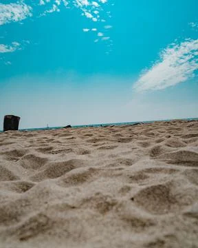 Surface level of sandy beach in wave patterns during summer Stock Photos