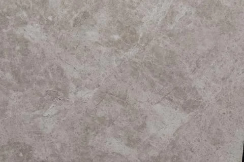 Surface with light grey marble patterns featuring natural texture and veining in Stock Photos