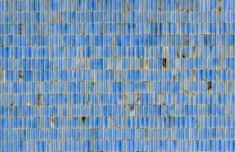Surface made of blue, vertically oriented tiling. Stock Photos