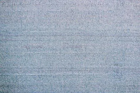 Surface made of coarse plastic textile fabric. 스톡 사진