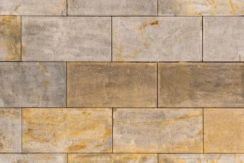 Surface made of regular, precisely laid beige blocks Stock Photos