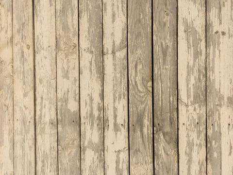 The surface is made of vertical old boards with peeling paint. Wooden texture Stock Photos