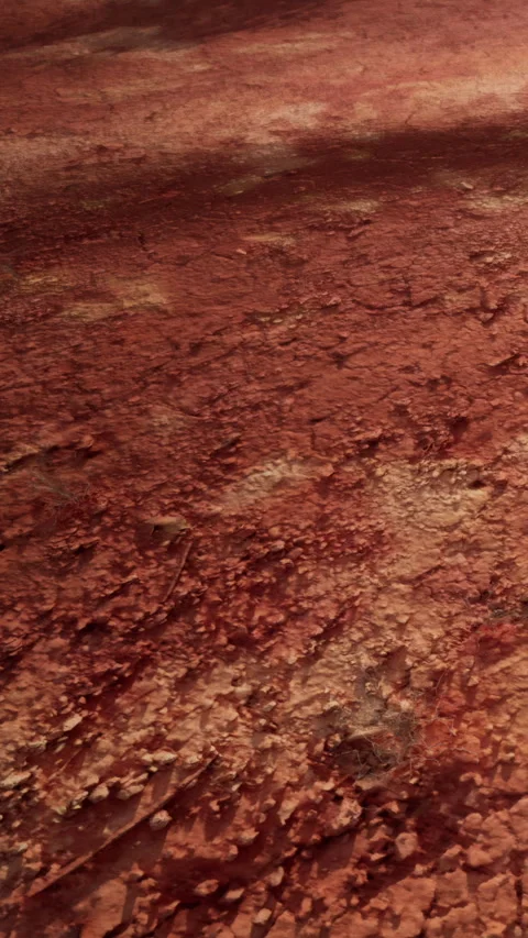 Surface of Mars showing red soil and rocky texture under sunlight Stock Footage 341250532