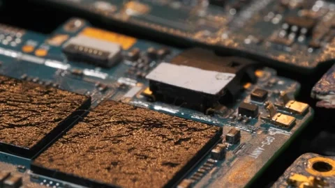 Surface of melted computer chips, cpu, circuit and microchip macro tracking shot Stock Footage 270454390