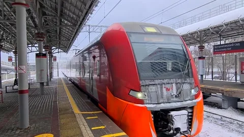 Surface metro train arrives at the station. Moscow Stock Footage 169362573
