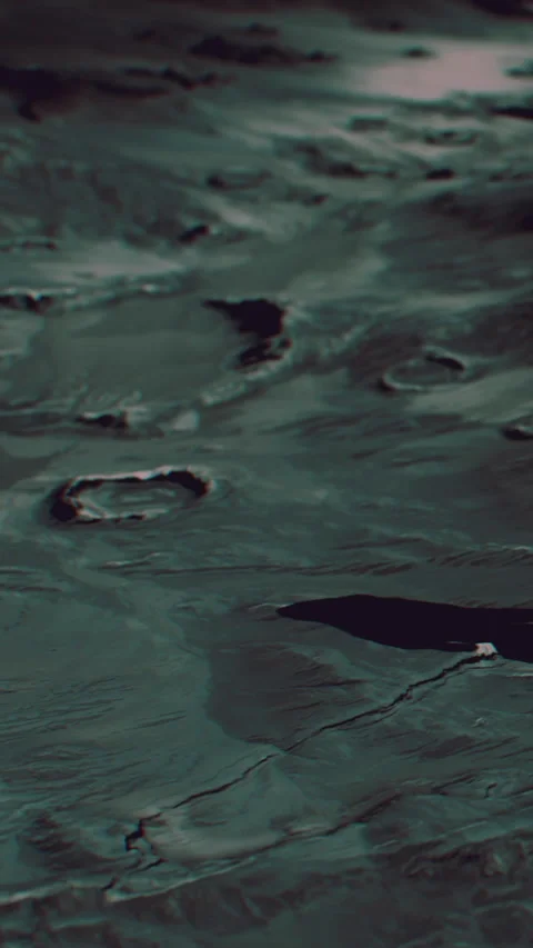 Surface of a moon with craters and dark patches under space view Stock Footage 344962515