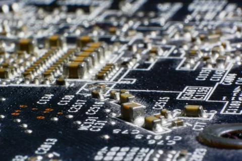 Surface-mount dusty smd components on used electronic circuit board. Stock Photos