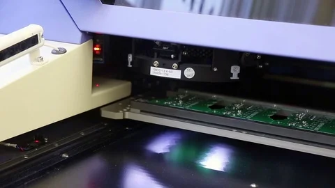 Surface Mount Technology Machine places elements on circuit boards Stock Footage 71571992