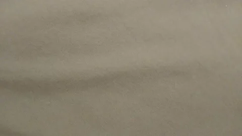 The surface of the natural fabric is gray in close-up Stock Footage 166436756