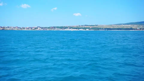 The surface of the ocean overlooking the village. Stock Footage 117797946