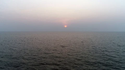 The surface of the ocean is taken from the drone in the evening in rays of sun. Stock-Footage 104664737