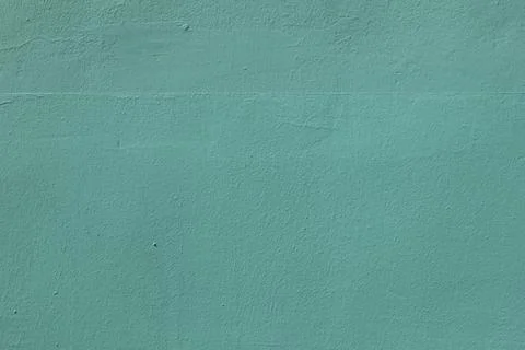 The surface of the old blue wall damaged by time. Stock Photos