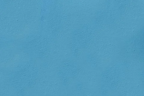 The surface of the old blue wall damaged by time. Stock Photos