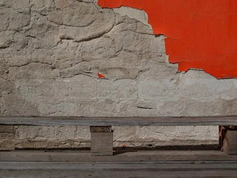 Surface of old bricks color plastered and cracked 写真素材
