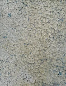 The surface of an old painted wall with badly cracked paint Stock Photos