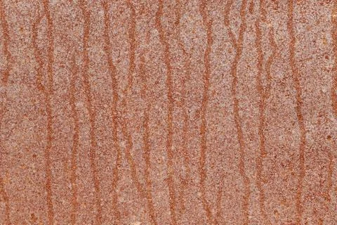 The surface of old, rusty sheet metal with vertical drips. Stock Photos