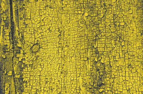 Surface of an old yellow cracked wall tinted in trendy illuminating yellow and Stock Photos