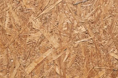 The surface of the oriented particle Board, pressed from a long strand. Stock Photos