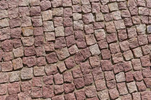 The surface of the path is paved with square cobblestones. Foto stock