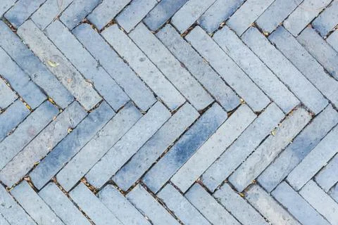 Surface paved with bricks. Stock Photos