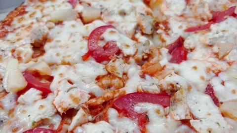 The surface of a pizza with melted cheese and tomatoes. Stock Footage 208951617