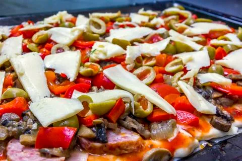 Surface of pizza prepared for baking Stock Photos