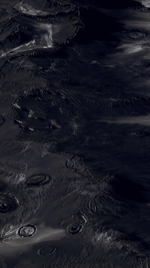Surface of a planet showing craters and other formations during nighttime Stock Footage 344961657