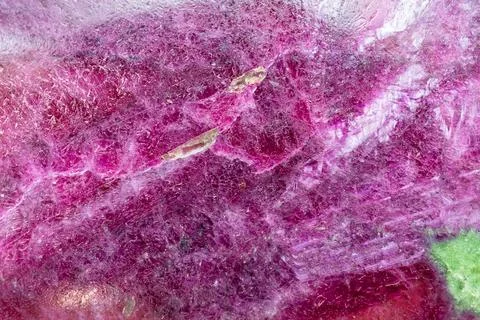 Surface of polished anyolite, ruby in zoisite rock Stock Photos
