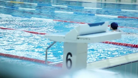 The Surface Of The Pool With Blue Water And Red Dividers Of Swimming Tracks. Stock Footage 109433138
