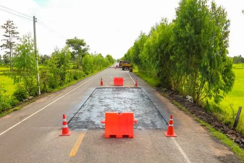 Surface preparation for road repairs. Stock Photos