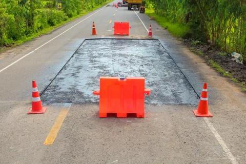 Surface preparation for road repairs. Stock Photos
