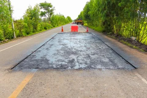 Surface preparation for road repairs. Stock Photos