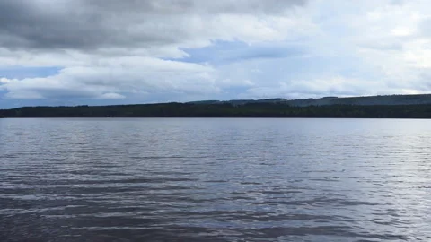 A surface of a quite lake in Scotland. Stock Footage 112681785